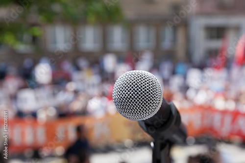 Protest. Public demonstration. Microphone.