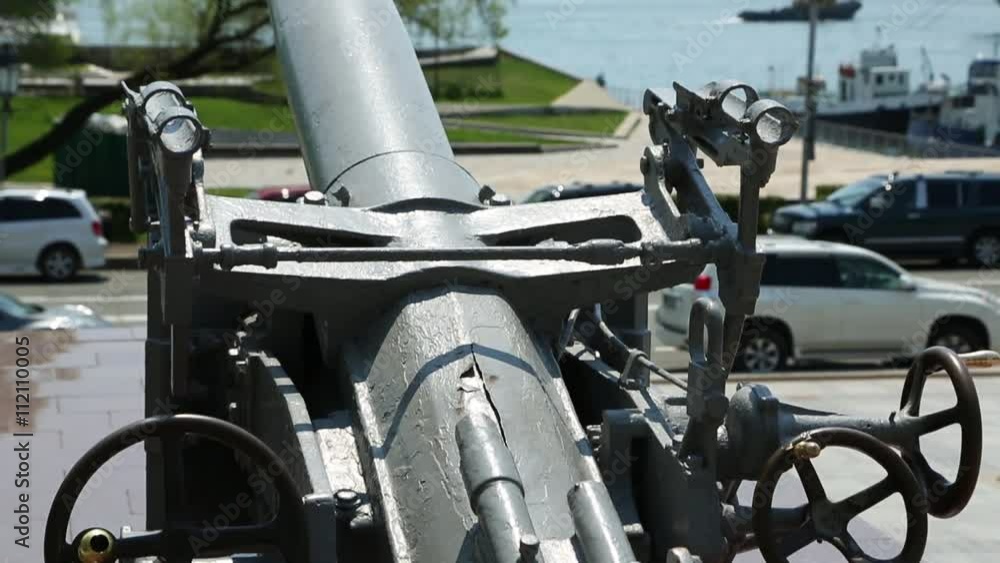 Old ships cannon mounted on the Waterfront of Ships the Golden Horn Bay in Vladivostok, Russia. Old ships cannon mounted on the Waterfront of Ships the Golden Horn Bay in Vladivostok, Russia.
