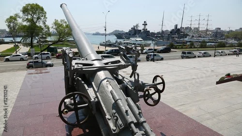 Old ships cannon mounted on the Waterfront of Ships the Golden Horn Bay in Vladivostok, Russia.