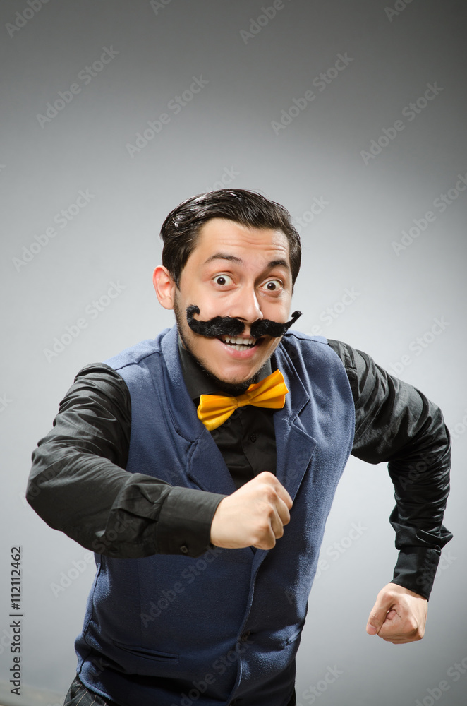 Fototapeta premium Funny man against dark background