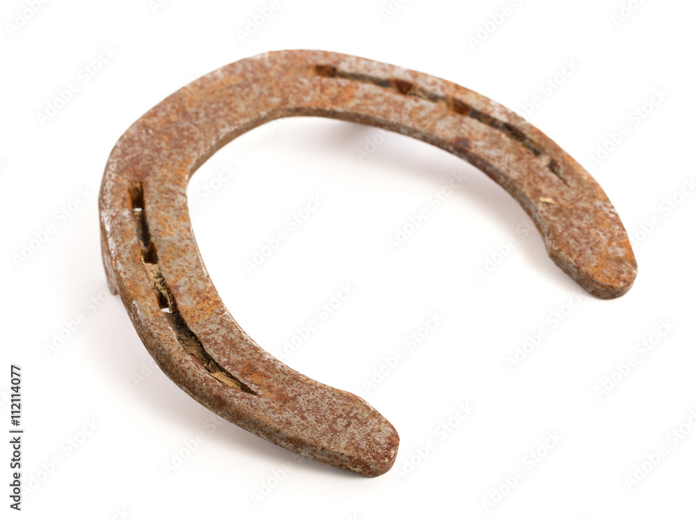 Old rusty horseshoe, selective focus Old rusty horseshoe, selective focus