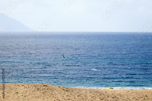 Kite on the empty beach in Atlantic