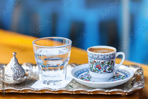 traditional oriental nougat with turkish coffee on a wicker tray