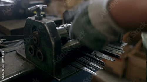 Work makes steel detail of on the machine photo