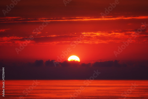 red sunset over the sea © mimadeo