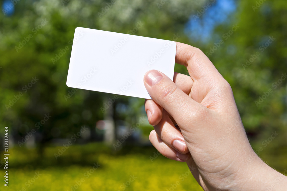 Hand with card vivid Hand with card vivid