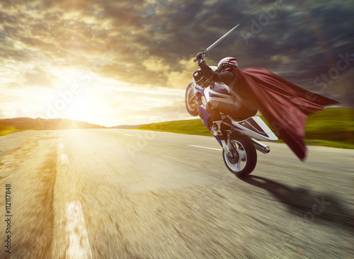 Conquerer on his bike