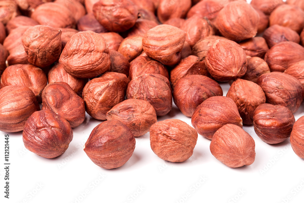 peeled hazelnuts isolated on white background macro peeled hazelnuts isolated on white background macro