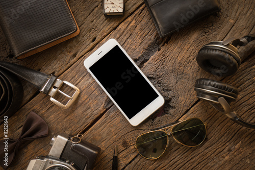 Men's casual  Old camera,mobile phone and supplies on office woo