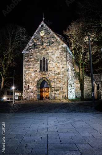 Stavanger Domkirke cathedral at night nicely lit. Dark gothic ci
