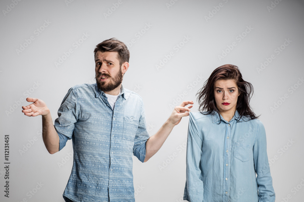 The young couple with different emotions during conflict The young couple with different emotions during conflict