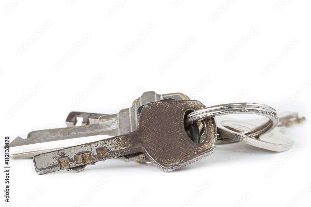 Bunch of old keys isolated on white background. Bunch of old keys isolated on white background.