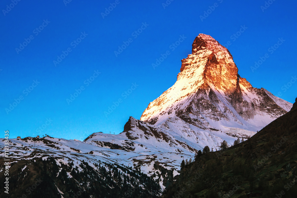 Golden sunlight shine on Matterhorn in early morning