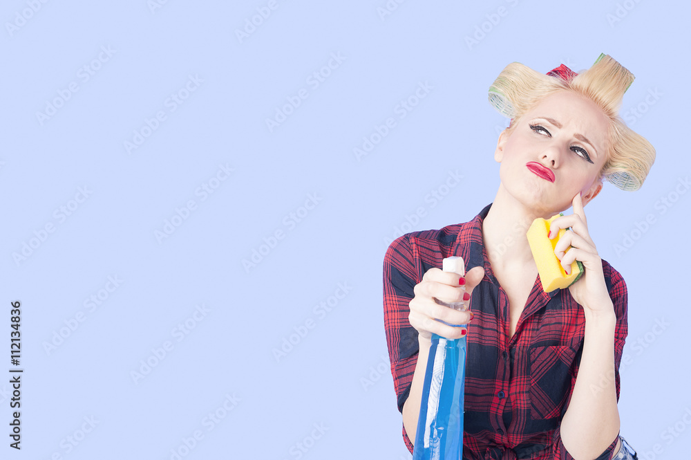 Obraz premium Young girl with cleaning product 