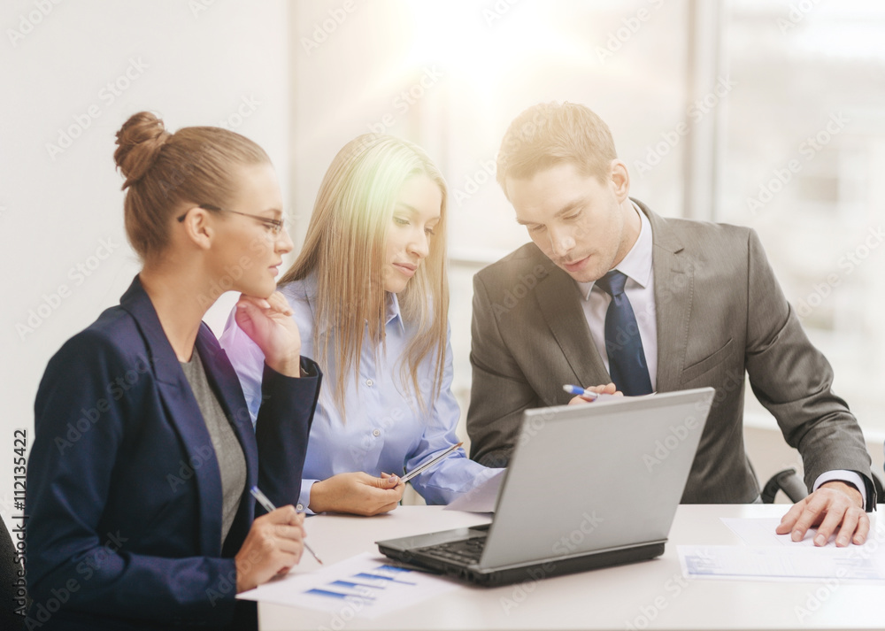 business team with laptop having discussion business team with laptop having discussion