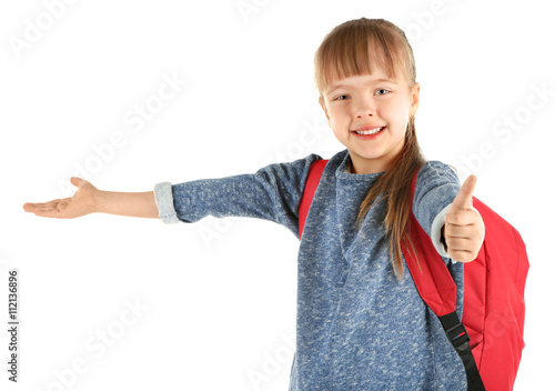 Schoolgirl with backpack is...