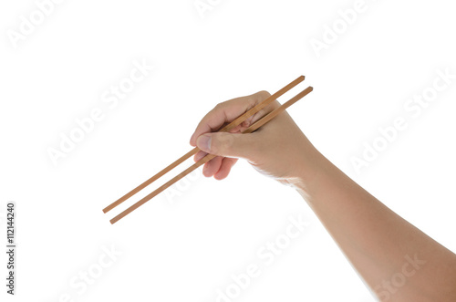 hand holding chopsticks, isolated on white