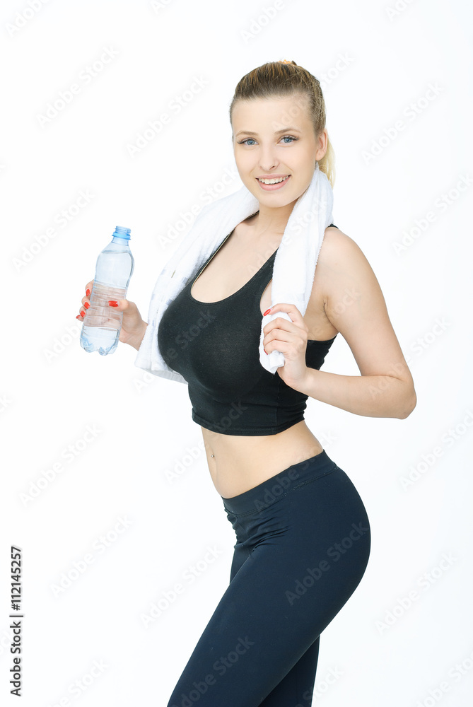 smiling fitnesswoman with water smiling fitnesswoman with water