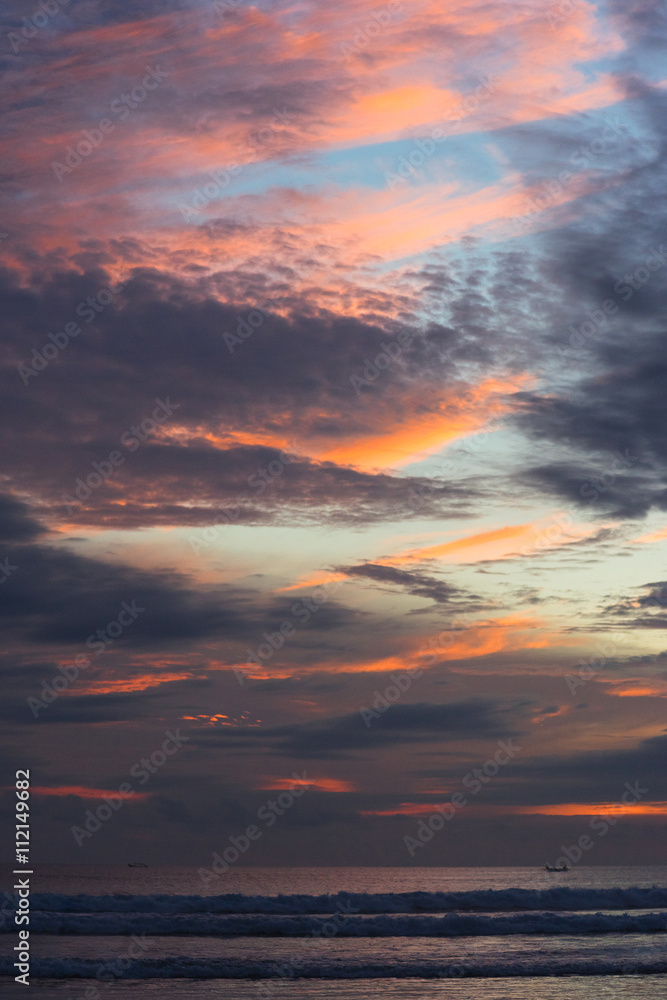 Tropical landscape traveler: a magnificent dramatic sunset on the ocean. Tropical landscape traveler: a magnificent dramatic sunset on the ocean.