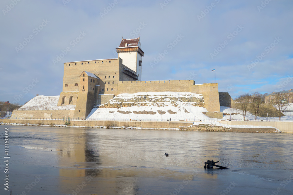 View of the castle Herman cloudy march morning. Narva, Estonia