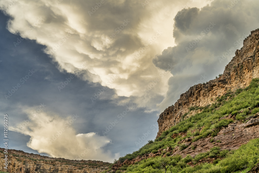 Dramatic clouds over sandstone cliffs near Fort Collins, Colorado