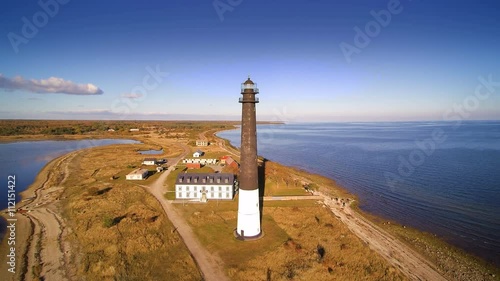 The Sorve lighthouse in an island. It is a cylindrical cemented lighthouse that is on the edge of the island of Saarema photo