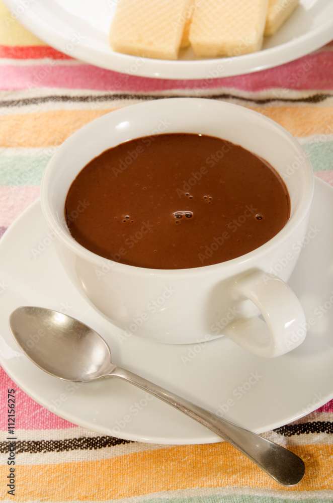 hot chocolate in a white cup with spoon hot chocolate in a white cup with spoon