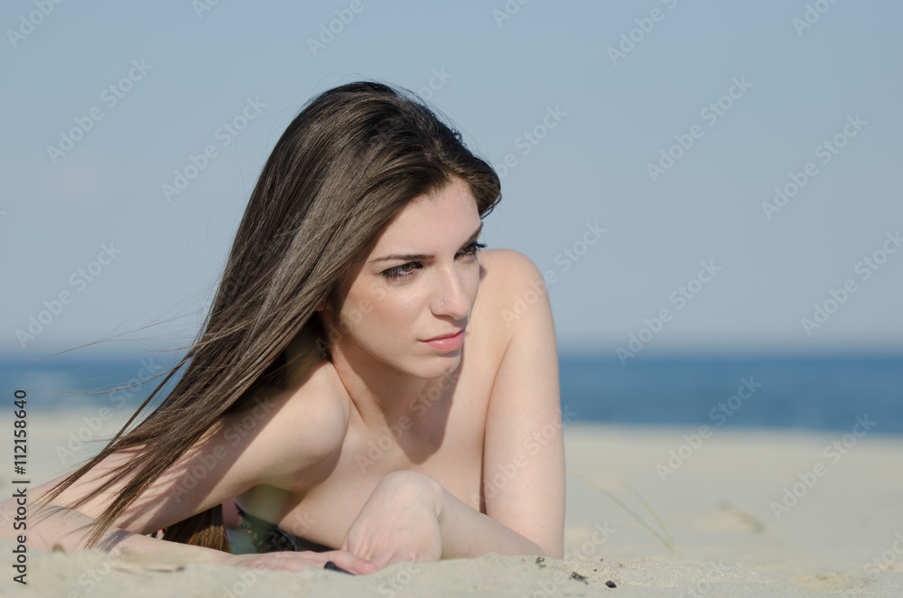 Atractive woman at the sea with bikini