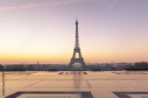 Morning view of Eiffel Tower from Trocadero with sunrise colors