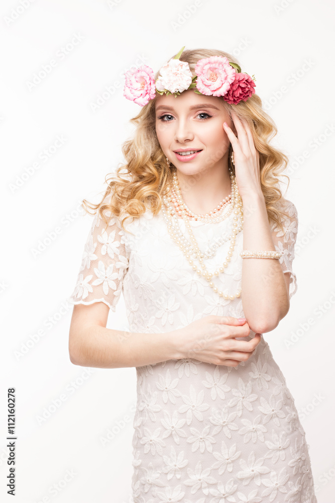 Beautiful girl with wreath of pink flowers, long curly blond hair and beautiful smile Beautiful girl with wreath of pink flowers, long curly blond hair and beautiful smile