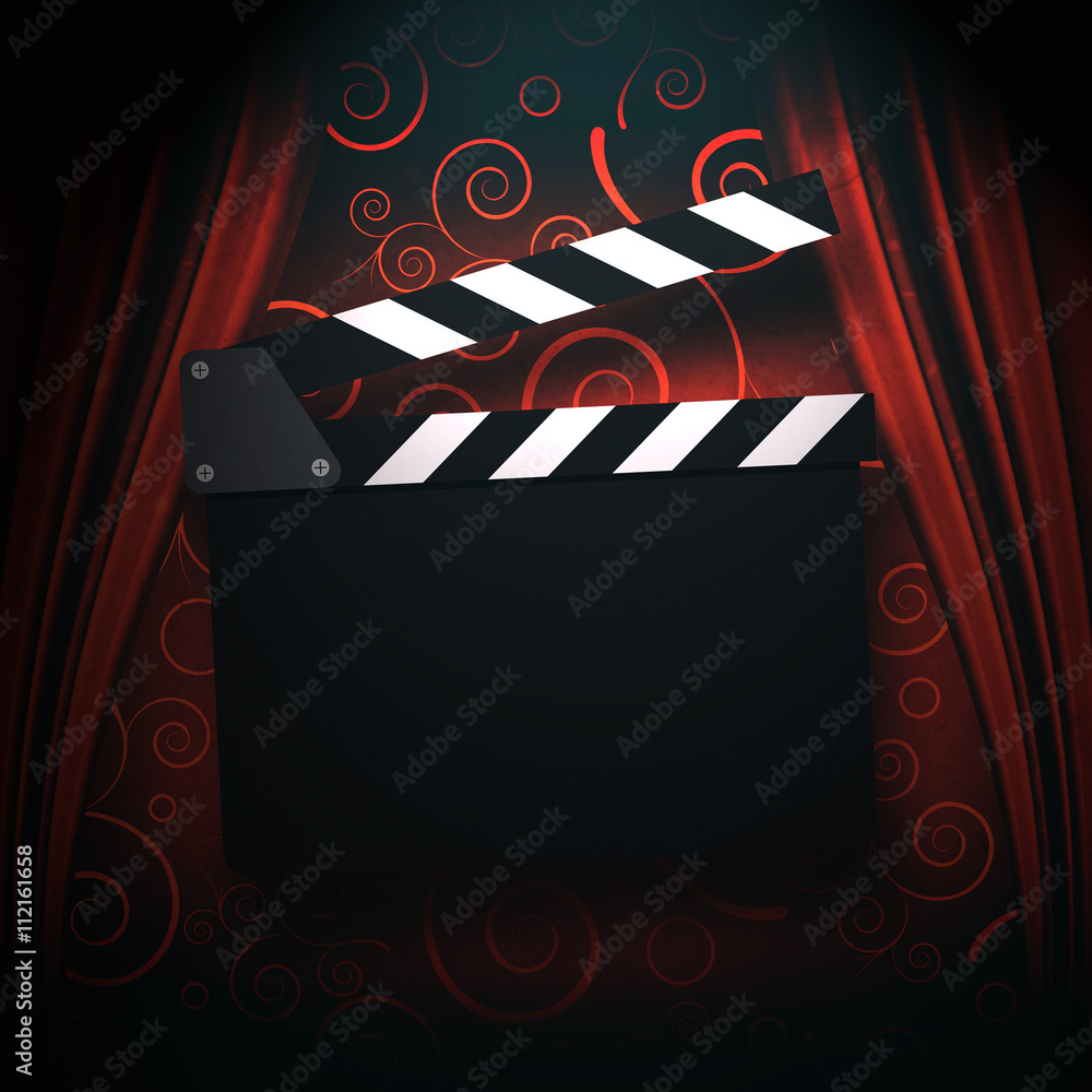 Fotografie Movie clapperboard on a red