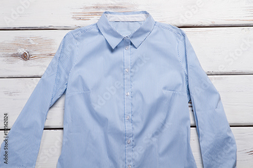 Blue shirt with long sleeves.