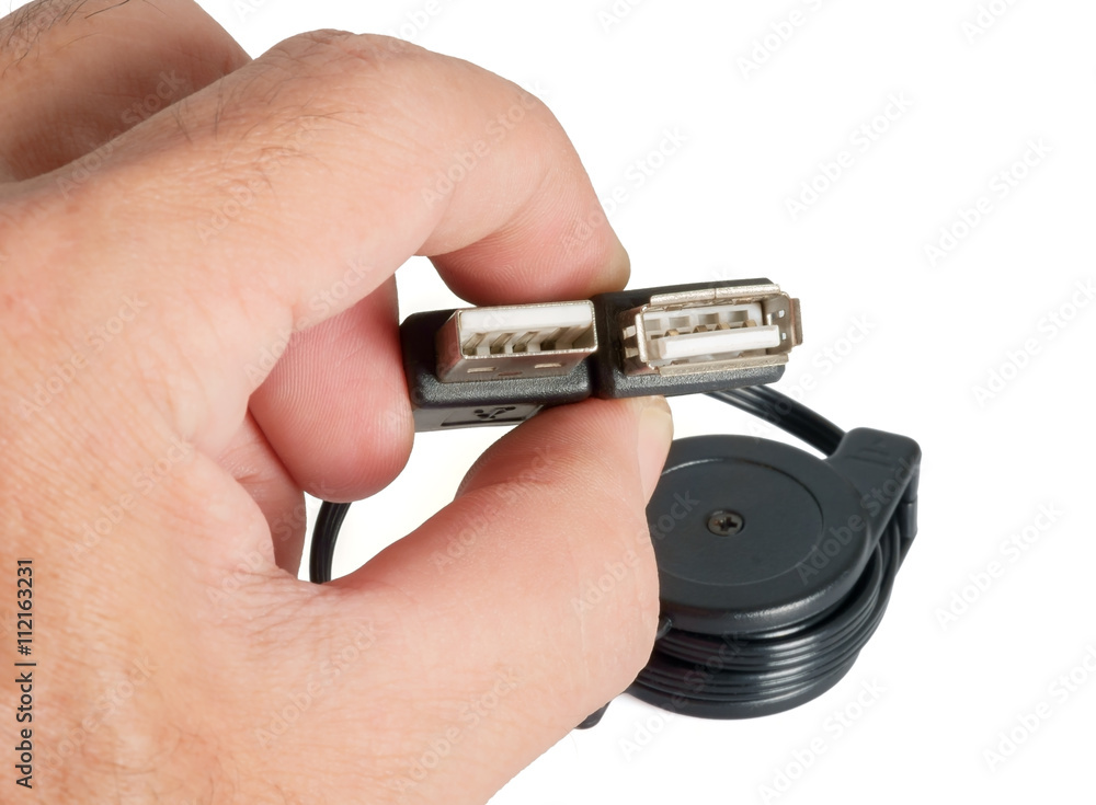 Universal Serial Bus / Universal Serial Bus (USB) in hand on white background. Universal Serial Bus / Universal Serial Bus (USB) in hand on white background.