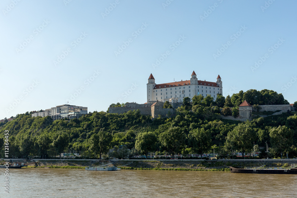 Bratislava castle,parliament and Danube river after rain, fall day Slovakia