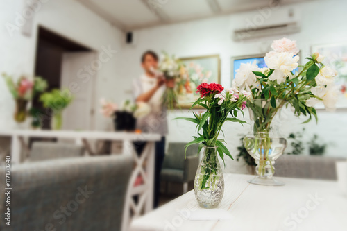 Beautiful spring flowers in glass vases