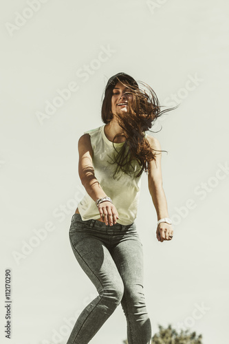 Portrait of carefree teenager girl outdoor. photo