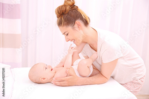 Mother and her baby on chan...