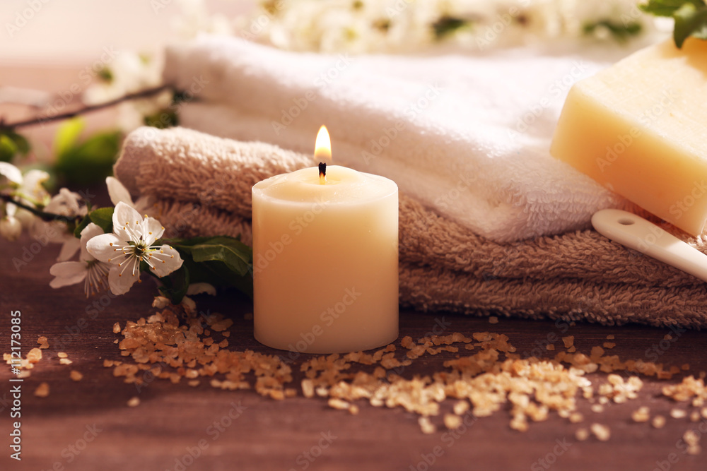 Spa composition with blooming branches on wooden table Spa composition with blooming branches on wooden table