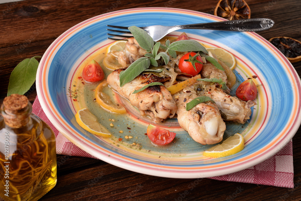 Chicken wings cooked with lemon and sage aromas Chicken wings cooked with lemon and sage aromas