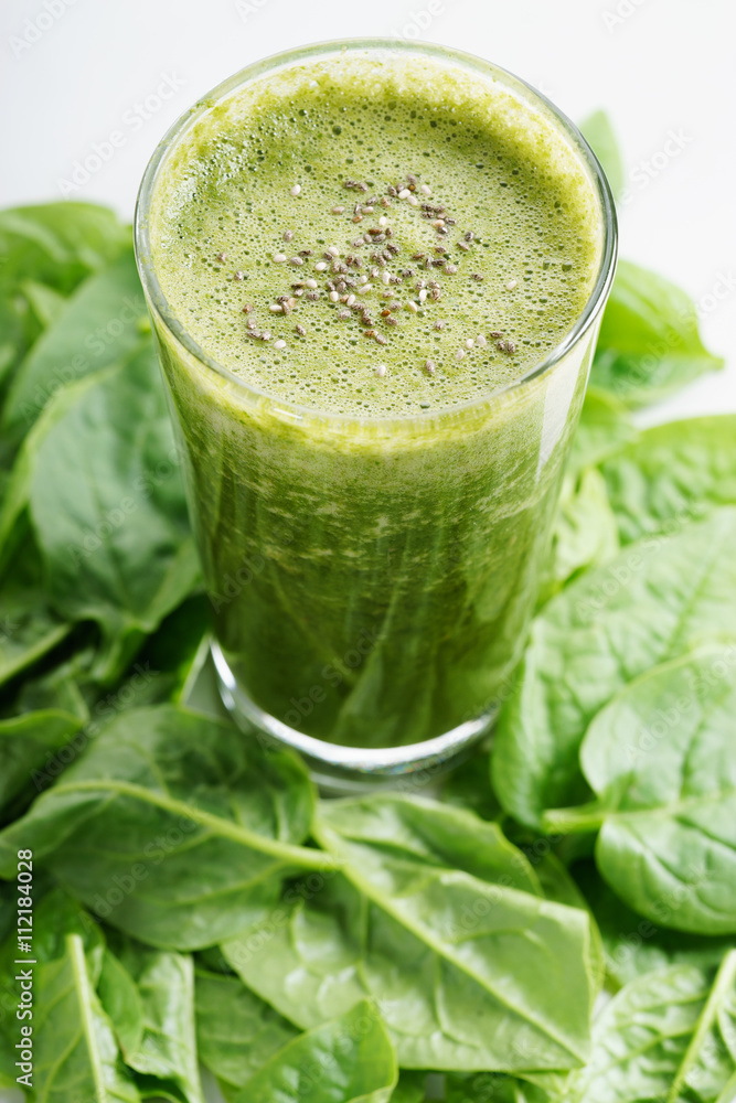 glass of fresh green spinach and kale healthy smoothie glass of fresh green spinach and kale healthy smoothie