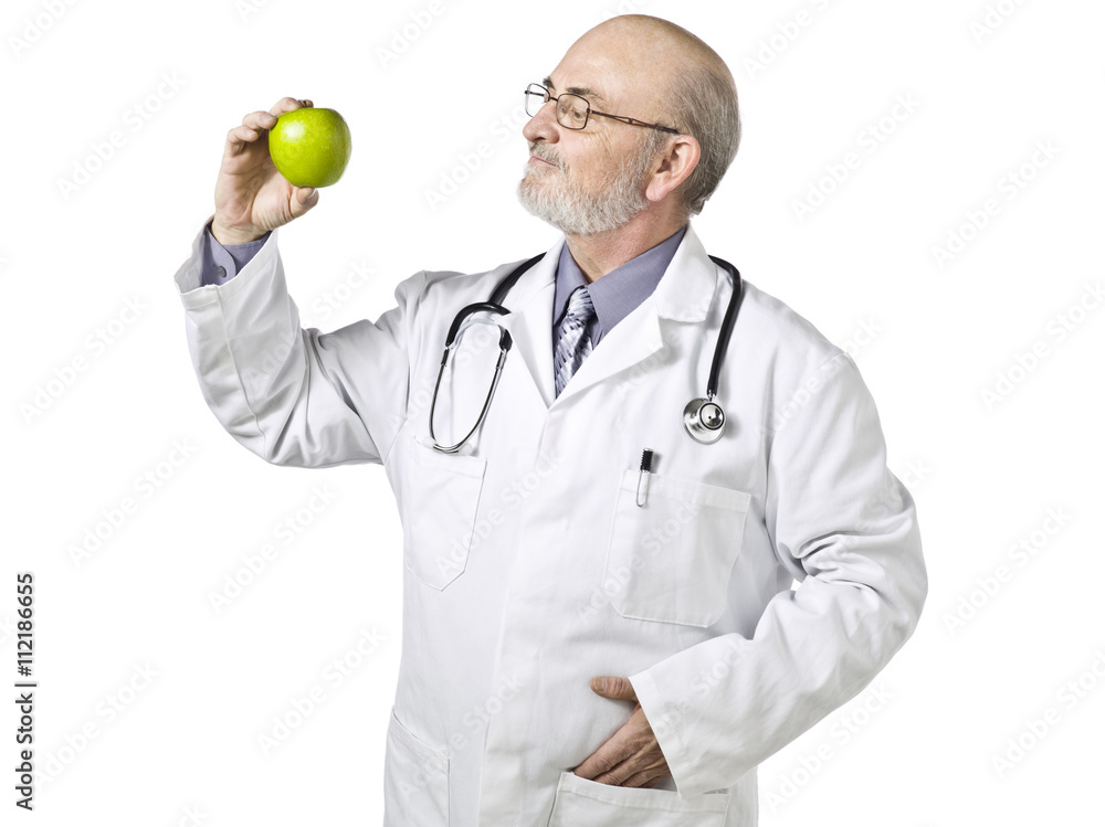 an old doctor holding a green apple an old doctor holding a green apple