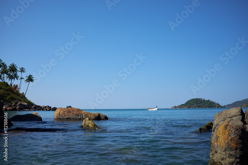 landscape of tropical beach with rocks