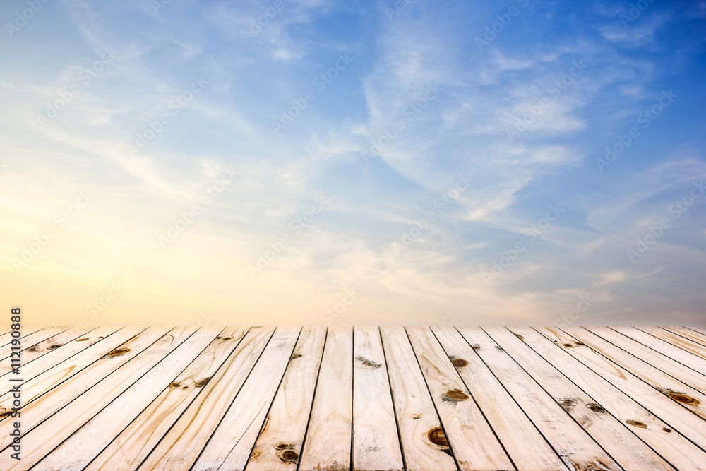 blue sunset sky and wood floor background