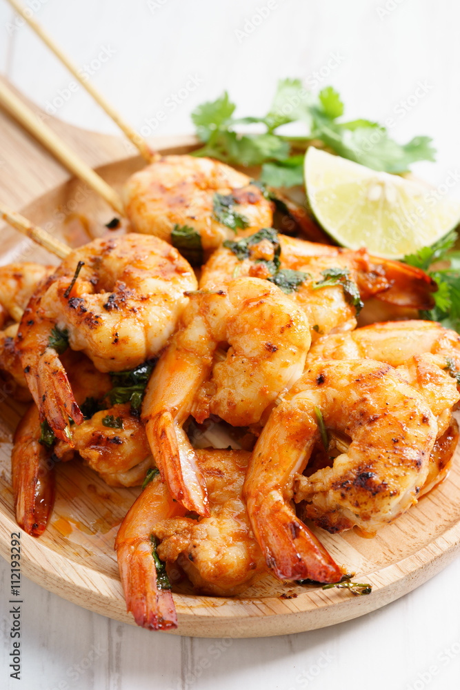 grilled shrimp kababs with sriracha and lime. grilled shrimp kababs with sriracha and lime.