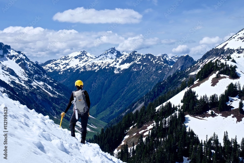 Man Alpinist Standing on Mountain Top. Ruth Mountains, North Cascades National Park, Bellingham, Washington State, USA. 