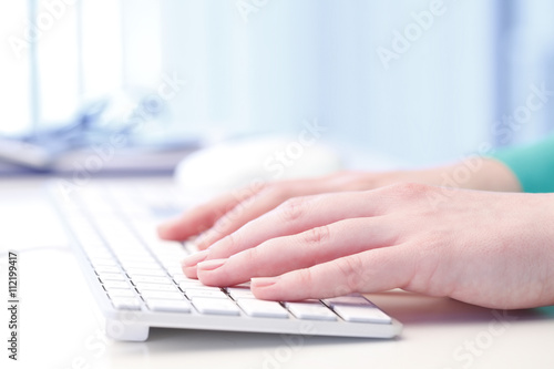 Typing on keyboard © gzorgz