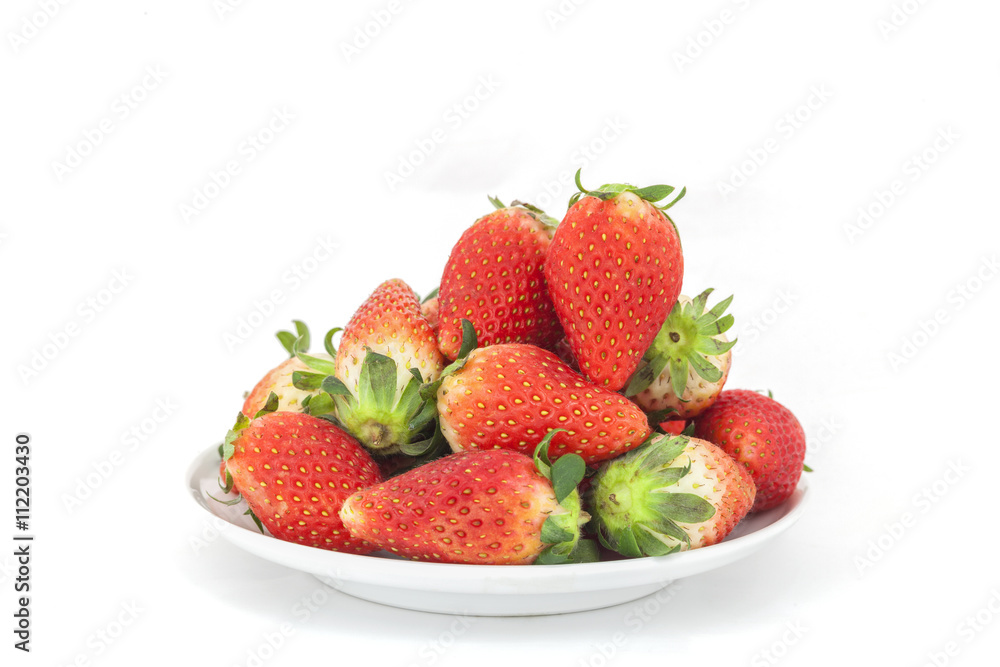 Red Strawberries on white plate isolated on white background. Red Strawberries on white plate isolated on white background.