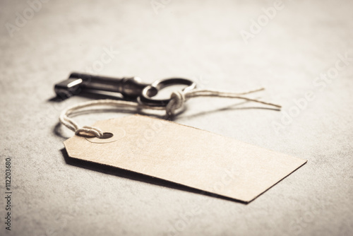 Blank key tag. Concept of a new home, vintage lifestyle and nostalgia.