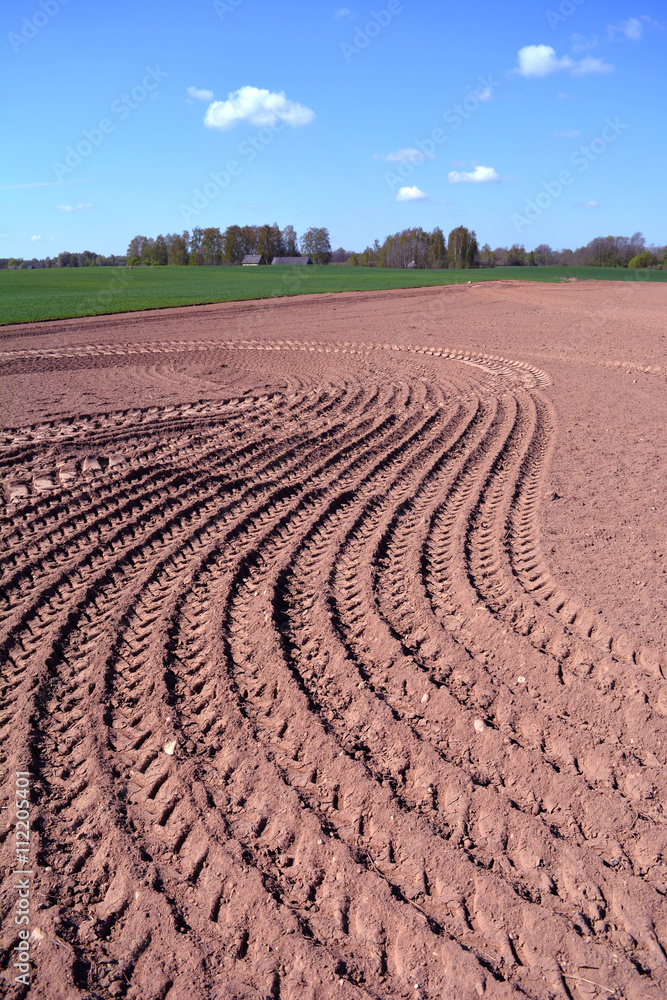 freshly plowed field in spring freshly plowed field in spring