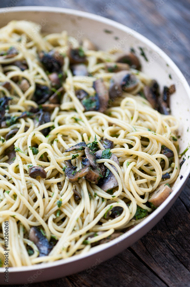 Italian pasta with mushrooms and pesto Italian pasta with mushrooms and pesto